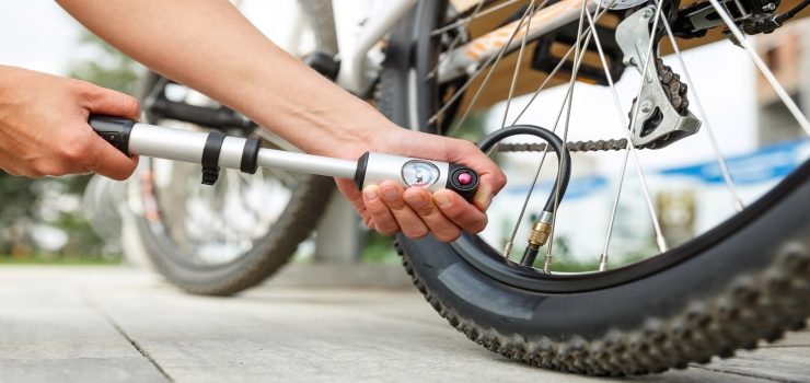 pumping up bicycle tyres